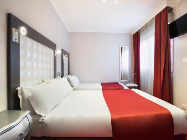 Grand Hôtel Amelot : photo 8 de la chambre chambre triple