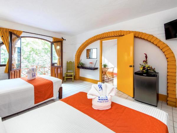 Hotel Hacienda de Vallarta Centro : photo 1 de la chambre chambre quadruple avec climatisation