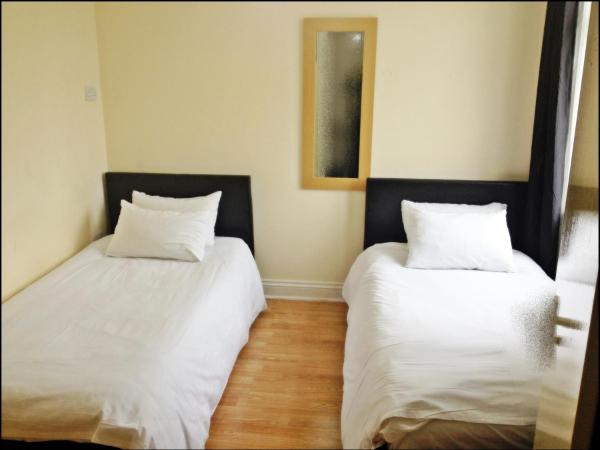 City View Hotel - Roman Road Market : photo 4 de la chambre chambre lits jumeaux standard