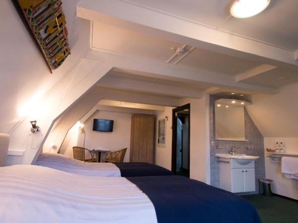 Hotel Adolesce : photo 4 de la chambre chambre double ou lits jumeaux avec salle de bains privative