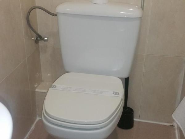 Hostal Lima : photo 5 de la chambre chambre triple