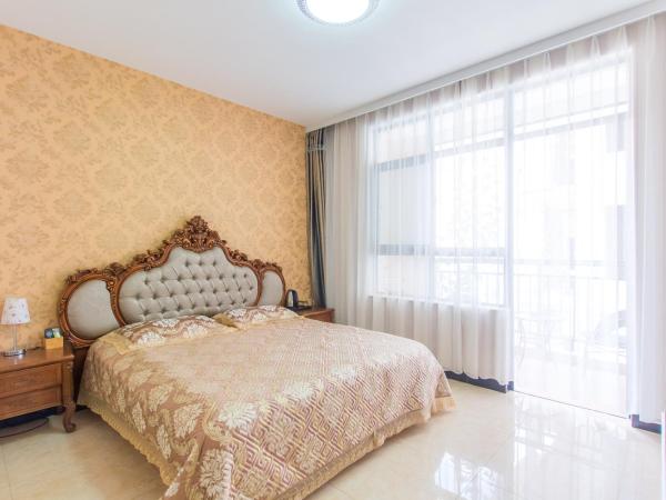 Sanya Passion fruit Inn : photo 7 de la chambre chambre lit queen-size avec balcon