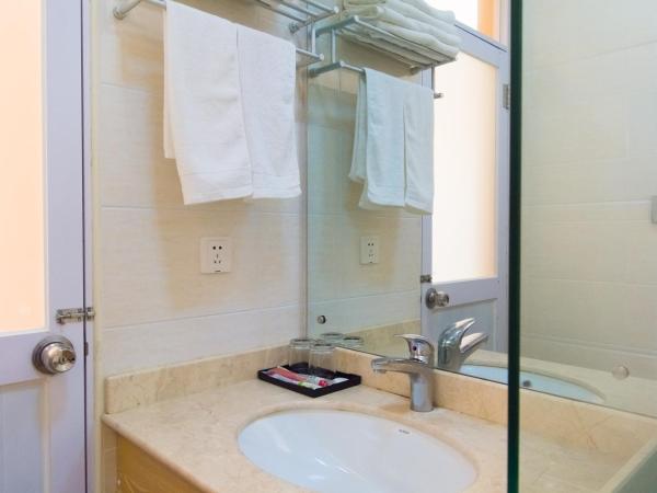 Sanya Passion fruit Inn : photo 2 de la chambre chambre lit queen-size avec balcon