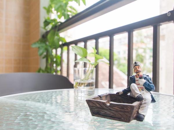 Sanya Passion fruit Inn : photo 5 de la chambre chambre double avec balcon