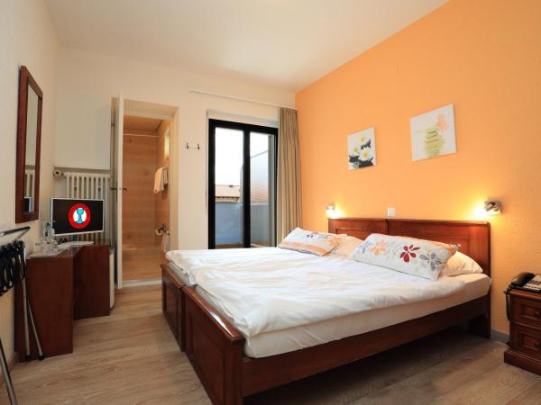 Osteria Ticino by Ketty & Tommy : photo 5 de la chambre chambre double ou lits jumeaux avec balcon - vue sur jardin