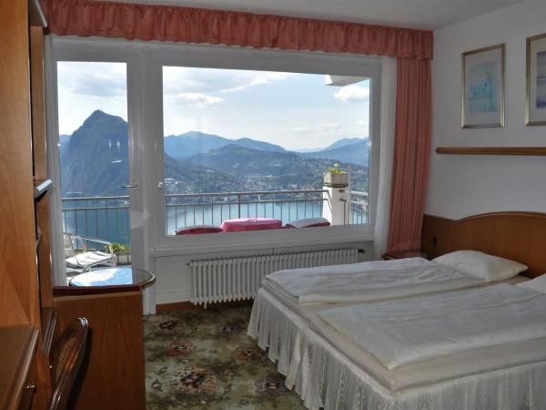 Hotel Colibrì : photo 3 de la chambre chambre double avec balcon - vue sur lac
