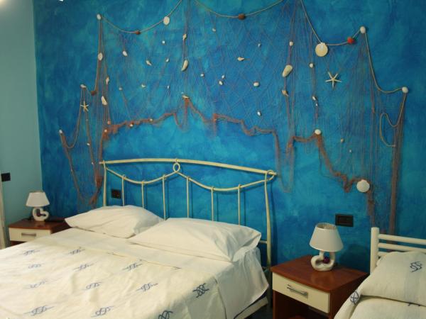 B&B Viale delle Colline : photo 7 de la chambre chambre triple