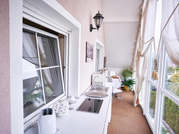 Bluestars Apartments : photo 6 de la chambre appartement - vue sur jardin