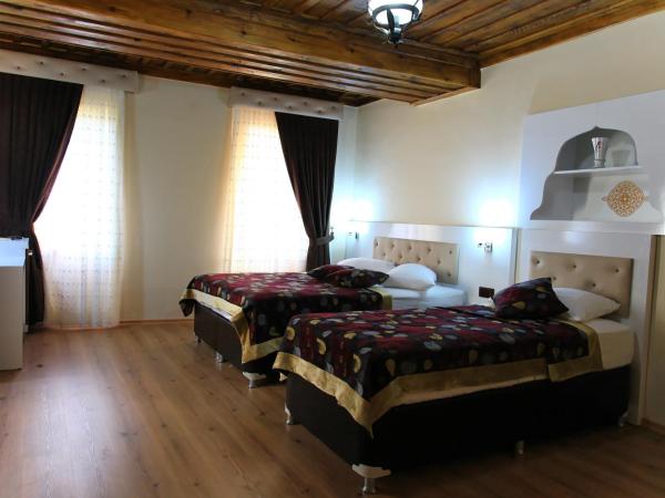 Bacchus Pension : photo 9 de la chambre chambre triple supérieure