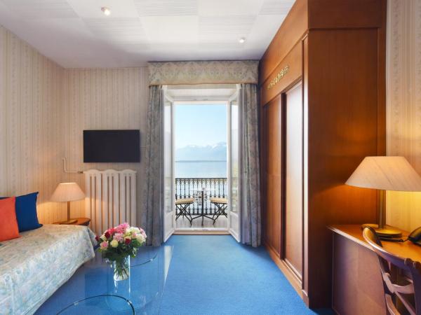 Golf Hotel René Capt : photo 2 de la chambre chambre triple standard avec vue sur le lac 