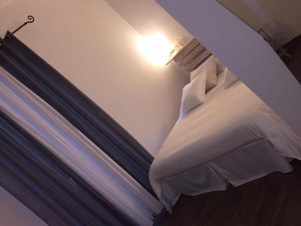 B&B Central Station Suite : photo 3 de la chambre chambre quadruple avec balcon