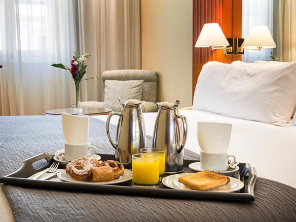 Exe Sevilla Macarena : photo 5 de la chambre chambre double ou lits jumeaux