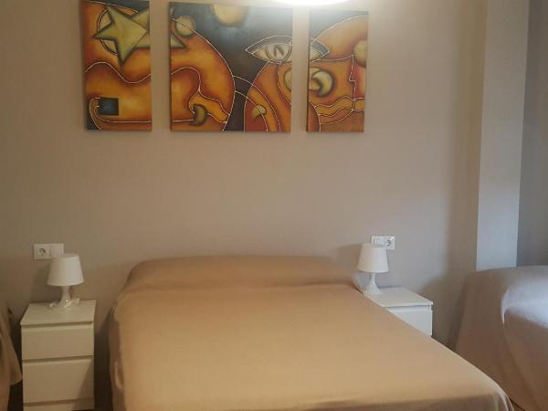 Pension Yna Holiday : photo 6 de la chambre chambre quadruple avec salle de bains commune