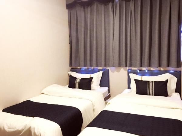 Seasons Hotel : photo 3 de la chambre chambre lits jumeaux