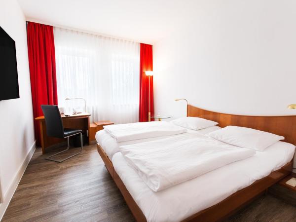 DORMERO Hotel Dresden Airport : photo 1 de la chambre chambre double ou lits jumeaux