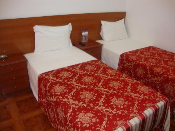 Residencial Valentina : photo 1 de la chambre chambre double ou lits jumeaux