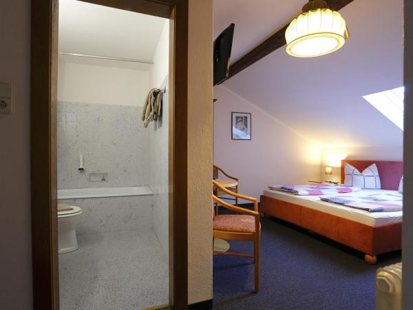 Alpen.Adria.Stadthotel : photo 2 de la chambre chambre familiale mansardée