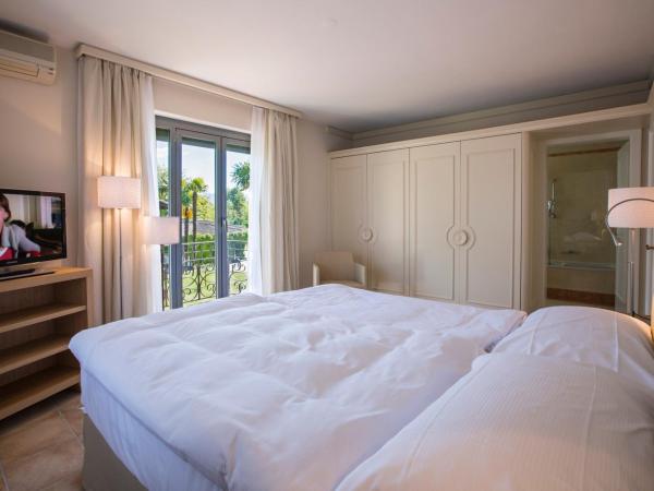 Villa Delta Suites House : photo 9 de la chambre suite junior avec balcon et accès au spa