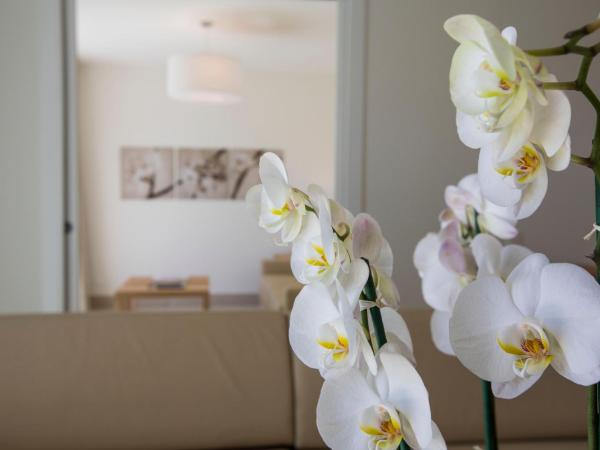 Delta Resort Apartments : photo 1 de la chambre appartement avec accès au spa - vue sur jardin