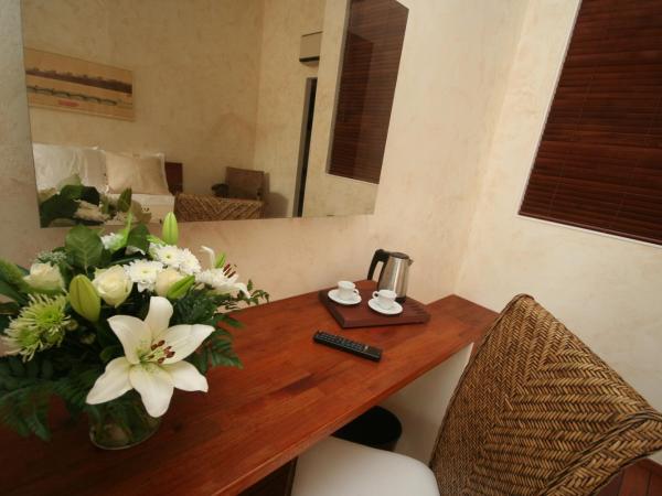 Ile du Gua Suites : photo 7 de la chambre suite avec baignoire spa et kitchenette