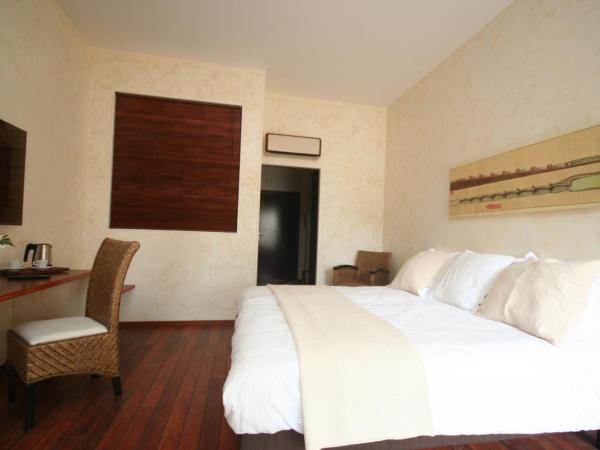 Ile du Gua Suites : photo 9 de la chambre suite avec baignoire spa et kitchenette