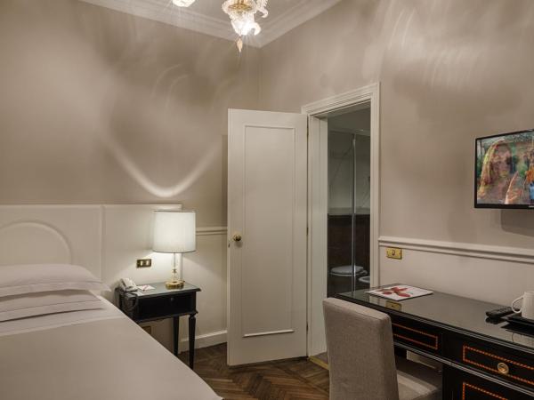 Plaza Hotel Lucchesi : photo 2 de la chambre chambre simple classique