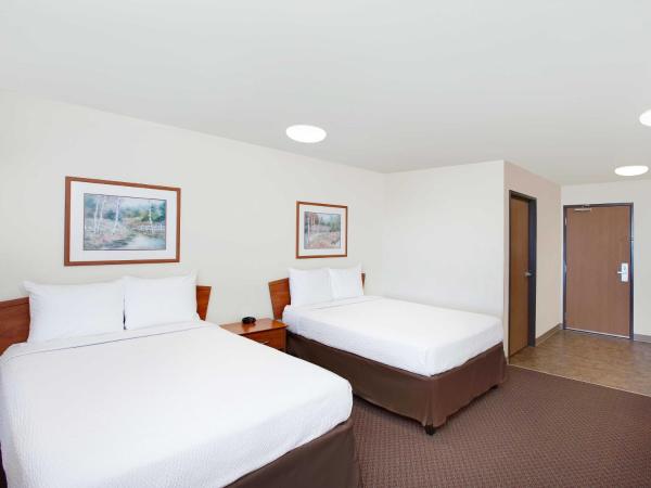 WoodSpring Suites Houston Willowbrook : photo 1 de la chambre studio avec 2 lits doubles