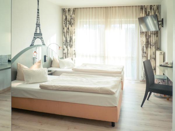 Ambiente Langenhagen Hannover by Tulip Inn : photo 3 de la chambre chambre lits jumeaux standard
