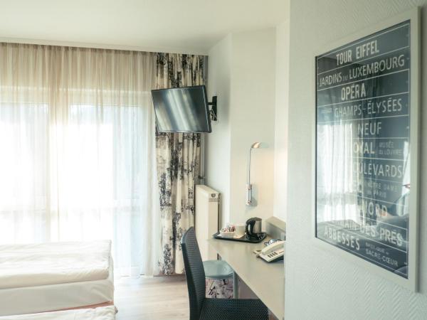 Ambiente Langenhagen Hannover by Tulip Inn : photo 4 de la chambre chambre lits jumeaux standard