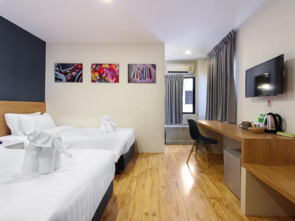 Pula Silom : photo 1 de la chambre chambre deluxe double ou lits jumeaux