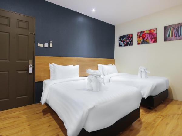 Pula Silom : photo 2 de la chambre chambre deluxe double ou lits jumeaux