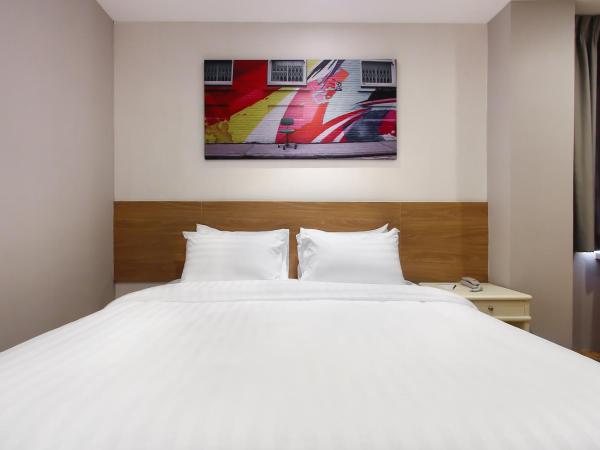 Pula Silom : photo 7 de la chambre chambre deluxe double ou lits jumeaux