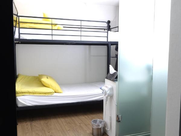 K Stay Guesthouse Myeongdong first : photo 4 de la chambre chambre lits jumeaux
