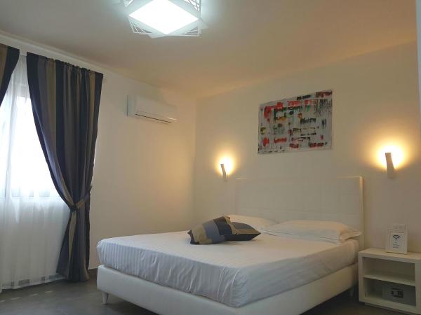 Etna Suite Group : photo 7 de la chambre suite deluxe avec baignoire spa