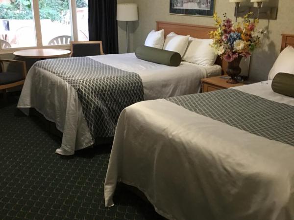 Travelodge by Wyndham Winnipeg East : photo 4 de la chambre chambre deluxe avec 2 lits queen-size - non-fumeurs