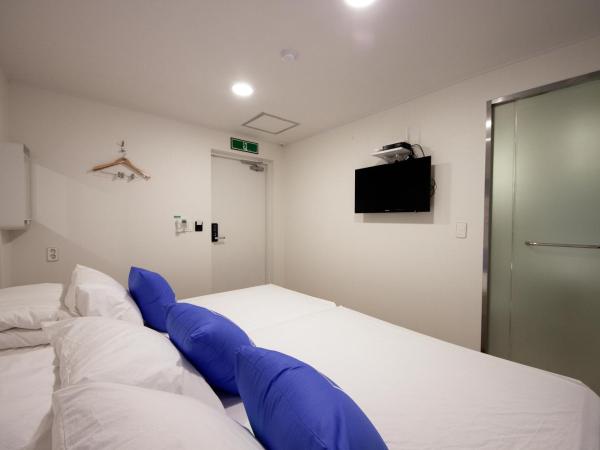 K-Guesthouse Myeongdong 1 : photo 4 de la chambre chambre triple