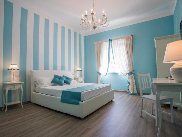 Les Suites Magnolia : photo 3 de la chambre chambre double supérieure