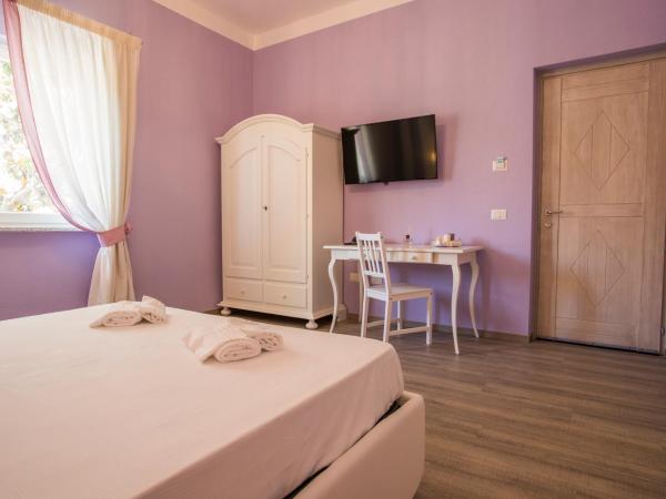 Les Suites Magnolia : photo 4 de la chambre chambre double standard