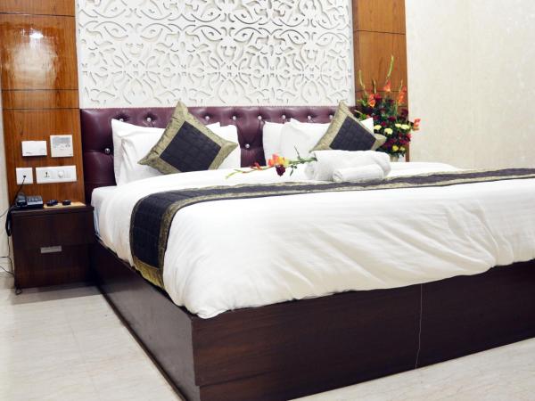 Trinity Corporate Udyog Vihar : photo 1 de la chambre chambre double