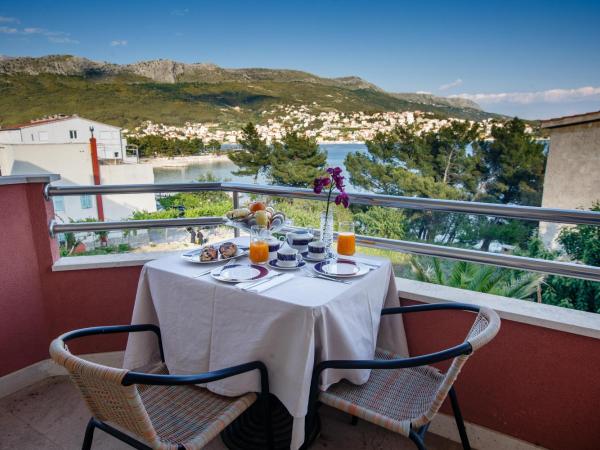 Rooms Split : photo 10 de la chambre chambre double ou lits jumeaux deluxe - vue sur mer