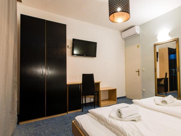 Rooms Split : photo 7 de la chambre chambre double ou lits jumeaux - vue latérale sur mer