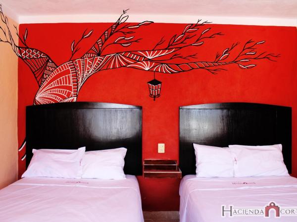 Hotel Hacienda Cortes : photo 2 de la chambre chambre quadruple