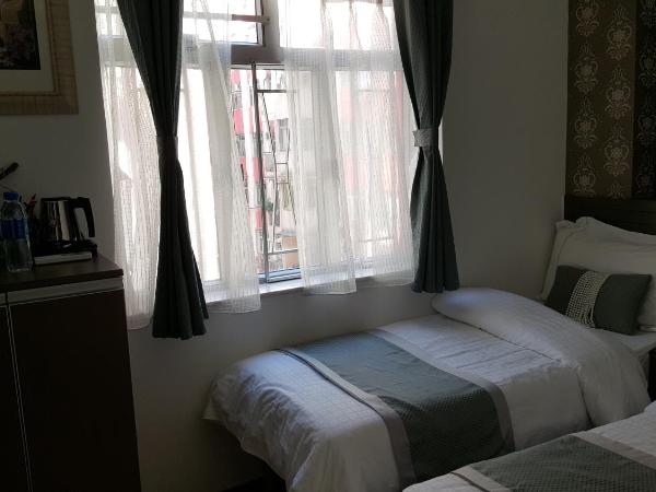 Seasons Hotel - Causeway Bay : photo 2 de la chambre chambre lits jumeaux