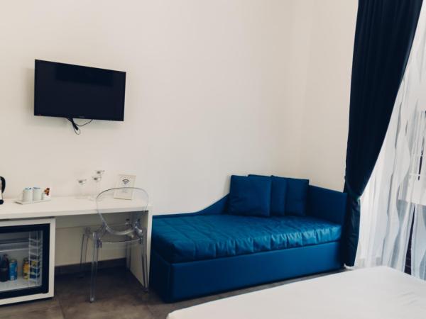 Etna Suite Group : photo 2 de la chambre chambre quadruple confort