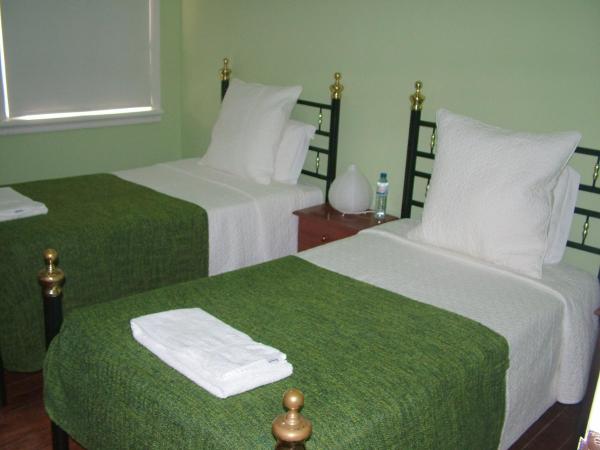 Residencial Valentina : photo 5 de la chambre chambre double ou lits jumeaux avec salle de bains commune