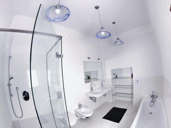 Hostel HOMEr - Old Town Square : photo 7 de la chambre lit simple dans dortoir mixte de 4 lits