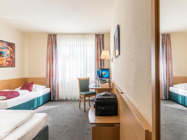 Hotel Am Moosfeld : photo 4 de la chambre chambre lits jumeaux classique