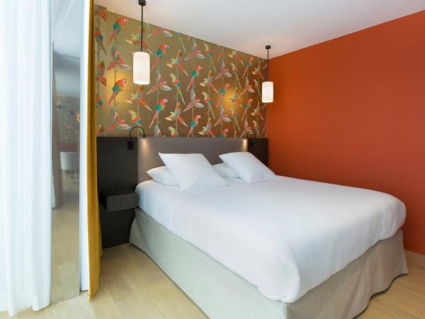 Hotel L'Arbre Voyageur - BW Premier Collection - LILLE : photo 7 de la chambre suite lit king-size avec jacuzzi
