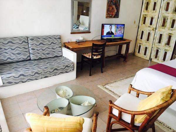 Maria's Kan Kin : photo 3 de la chambre chambre lit king-size - vue sur océan