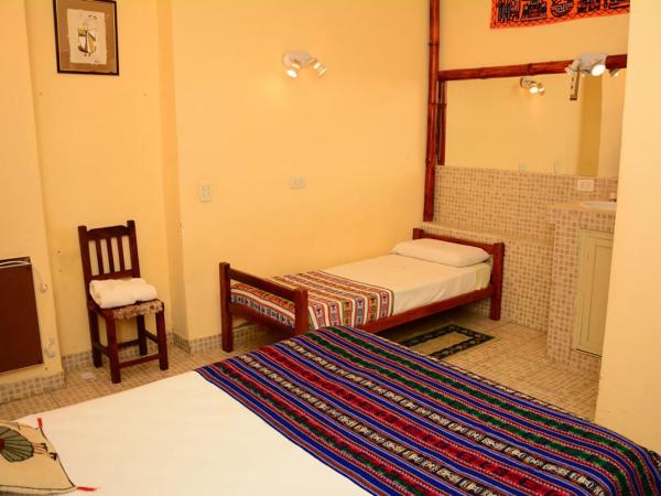 Hostal Yatasto : photo 2 de la chambre chambre quadruple